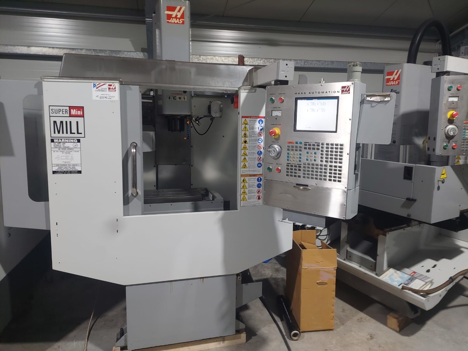 Фрезерний станок с ЧПУ Haas super mini mill. Haas TM 1
