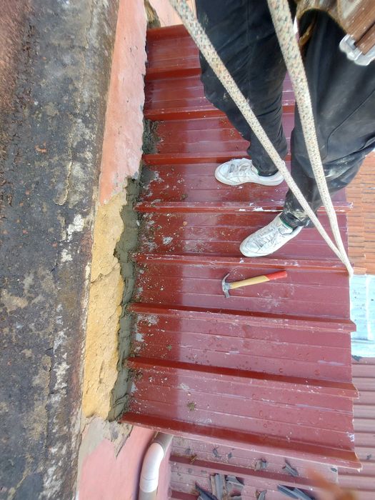Pintura de prédios em Rapel/telhados