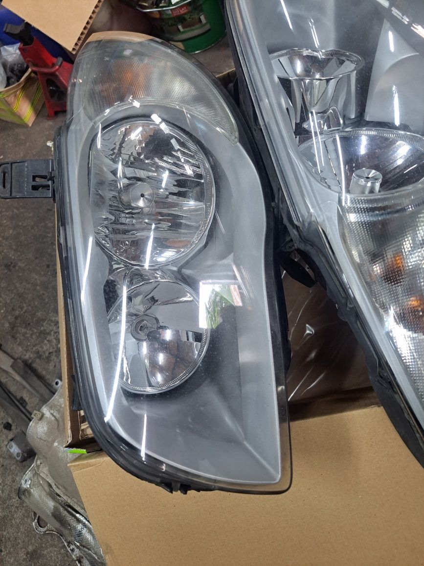 Lampy BMW seria 1  E87  oryginał L-893.109.11, P-893.109.211 11