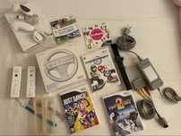 Nintendo Wii + comandos + jogos + cabos necessários