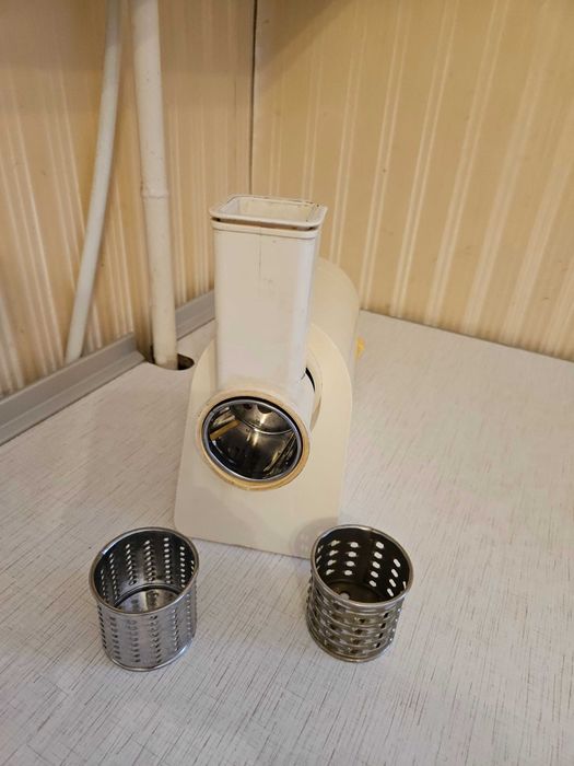 М'ясорубка Tefal з тертушками - подрібнювачами для овочів