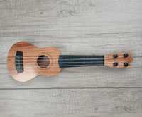 Zabawkowa gitara dla dzieci nowa
Wymiary: 35x11 cm