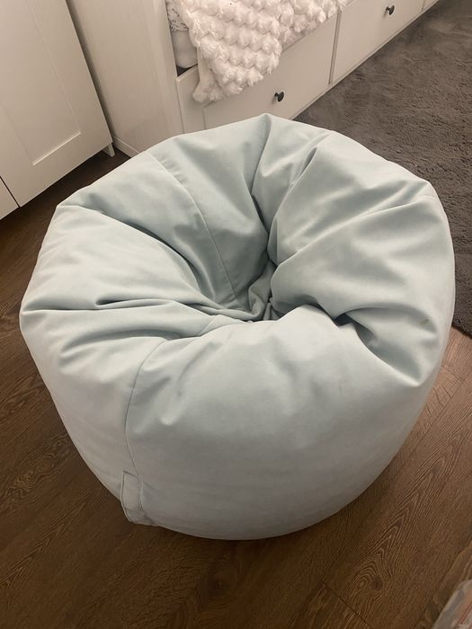 Pufa Italpouf w kolorze oliwkowym o średnicy podstawy 80 cm