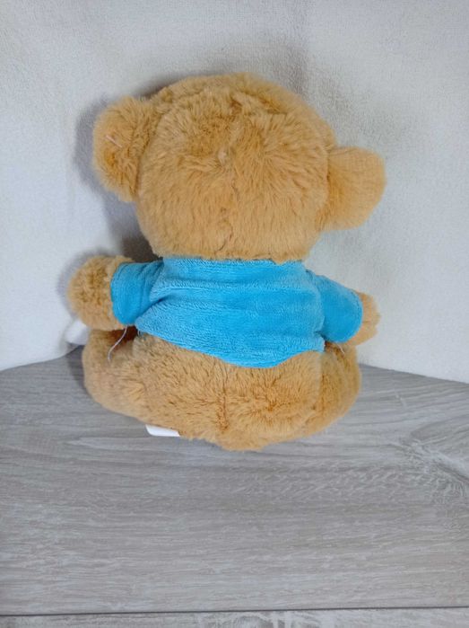 Pluszowy miś w ubranku