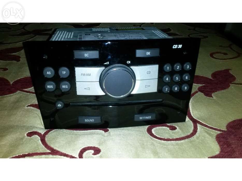 Vendo rádio Opel Astra CD30 (em preto) + BID (com moldura)