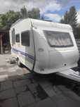 PRZYCZEPA KEMPINGOWA HOBBY SF400  niski DMC 1100 , przedsionek , solar