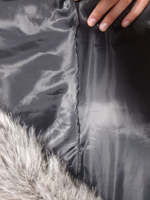 Меховая жилетка женская