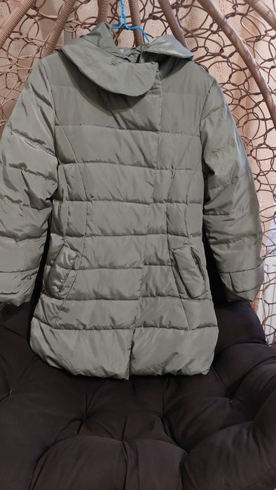 Зимова довга куртка