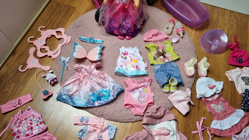 Wózek, lalka typu baby born, wanienka, zestaw ubranek i akcesoria