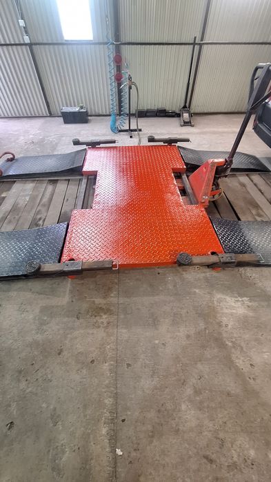 Podnośnik pneumatyczny płytowy. Niski wulkanizacja mechanika.