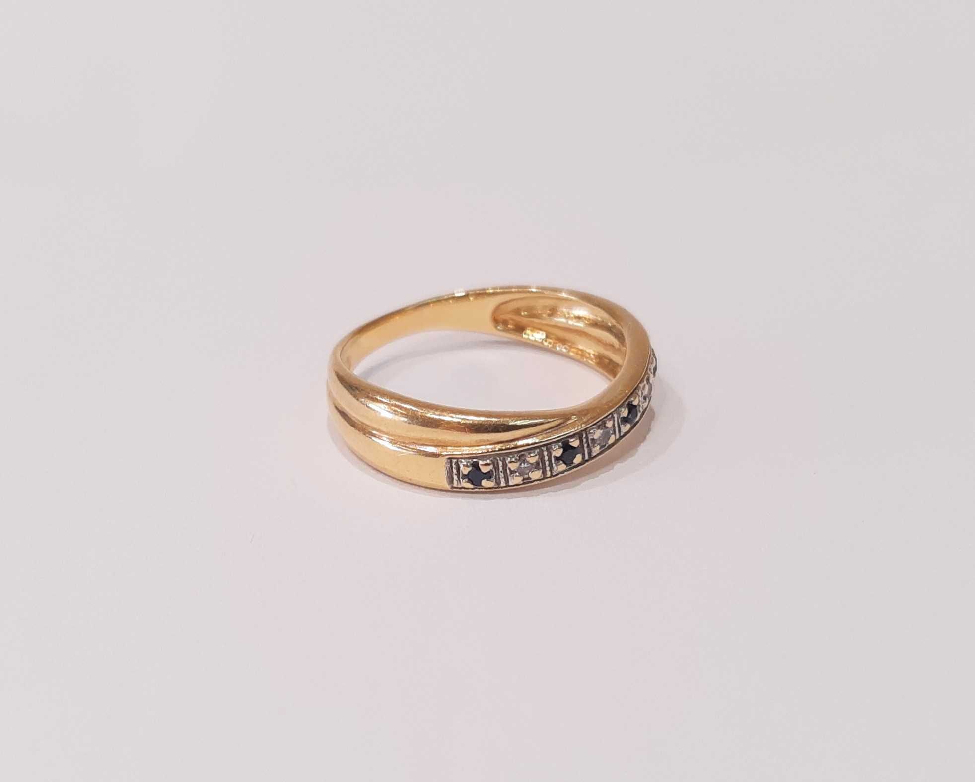Złoty pierścionek z brylantami i szafirami r.15,5  0,06 ct-3,15g/p.585
