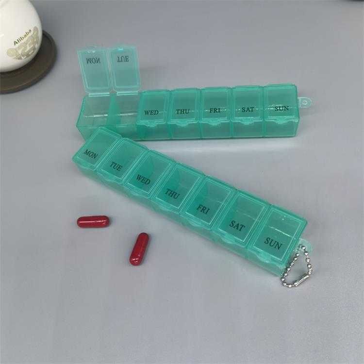 Таблетниця на 7 комірок 1 тиждень органайзер для таблеток з ланцюжком