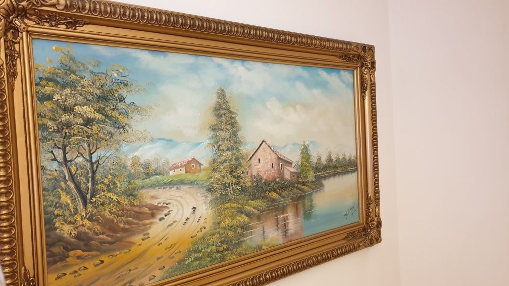 Quadro pintado a óleo com moldura trabalhada dourada