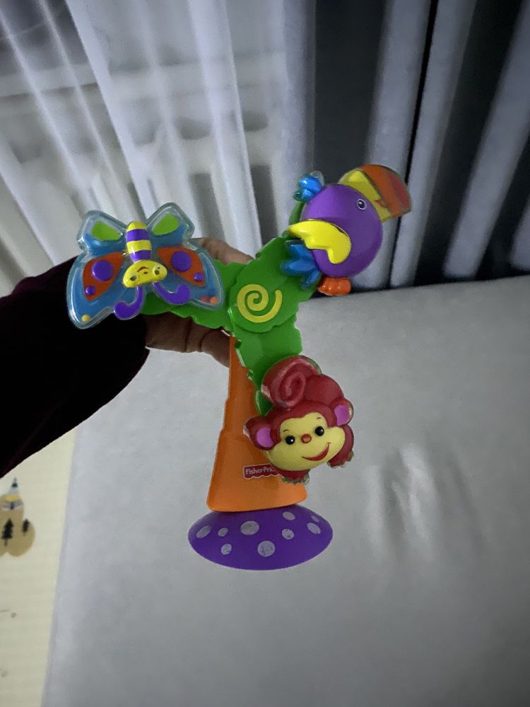 Іграшка на столик для годування Крутна пальмочка Fisher-Price