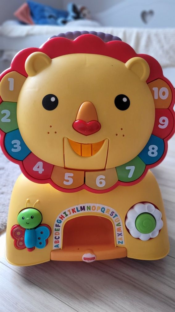 Jeździk pchacz lew od Fisher price