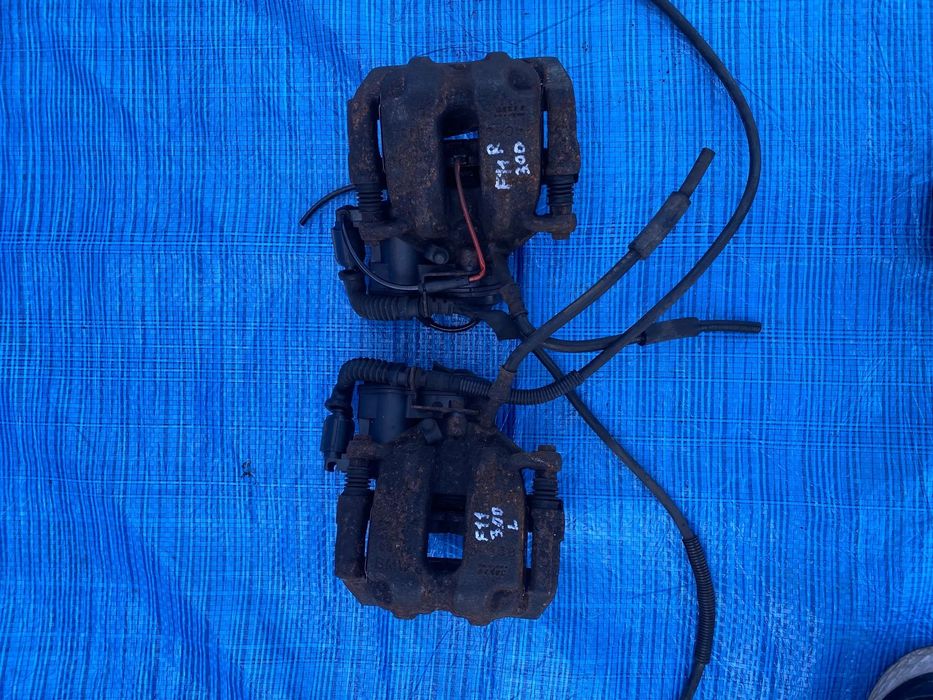 BMW F10 F11 ZACISK HAMULCOWY TYŁ LEWY PRAWY 3.0D 32349660