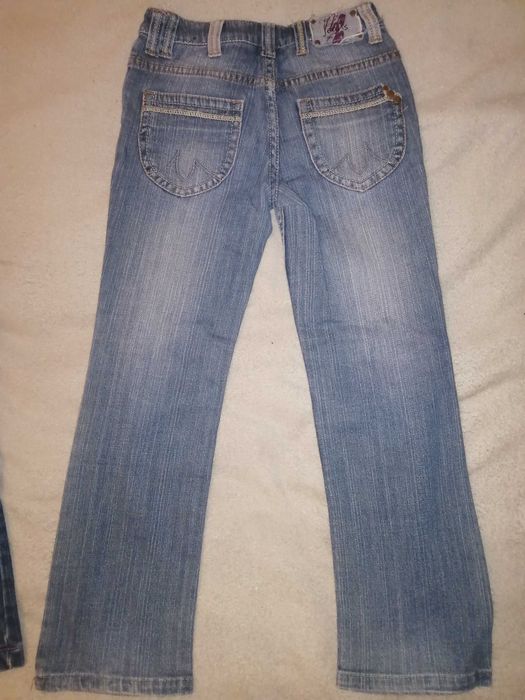 Dwie pary spodni dżinsowych - 128 cm