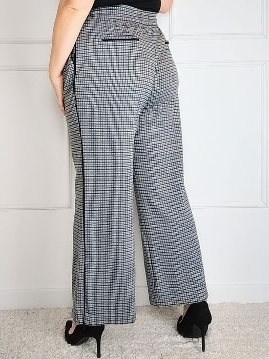 Szare spodnie z szerokimi nogawkami plus size 46