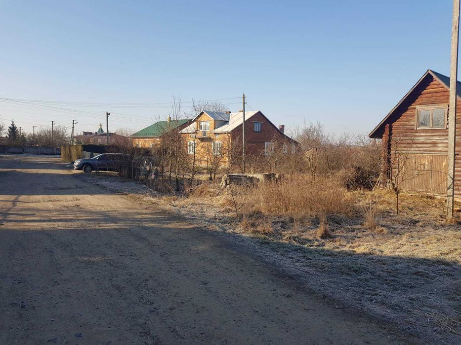 Будиночок зі зрубу та земельна ділянка 15 сот. с. Забужжя