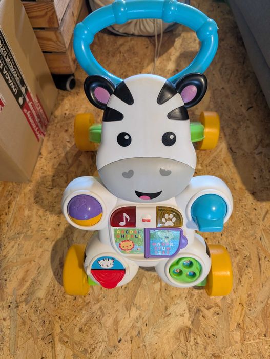 Pchacz jeździk chodzik zeberka Fischer Price działający