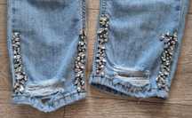 Oryginalne viralowe spodnie leansowe Liu Jo r. 27, s. Glamour nowe