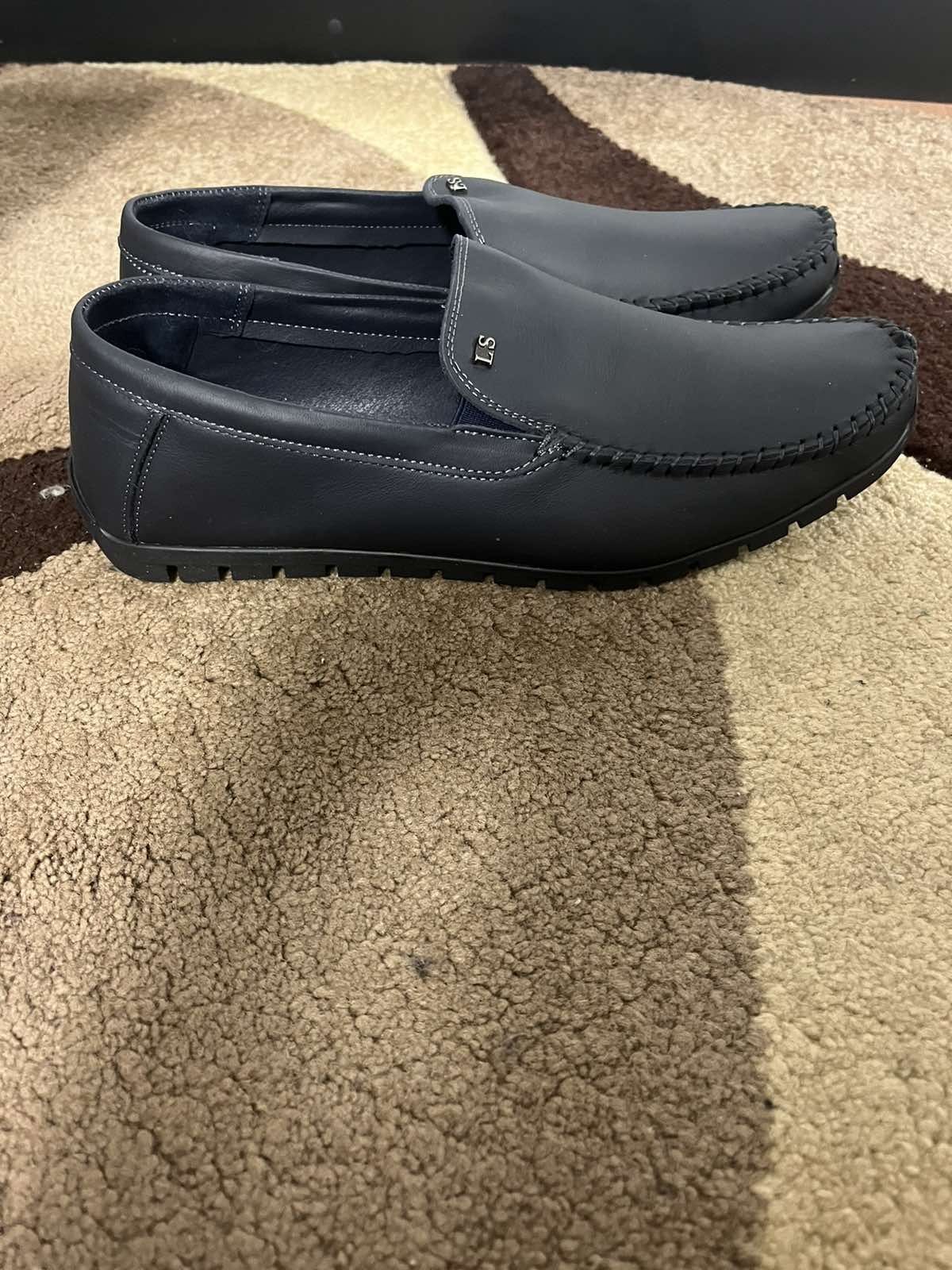 Нові чоловічи туфлі