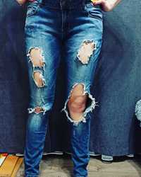 Женские рваные джинсы