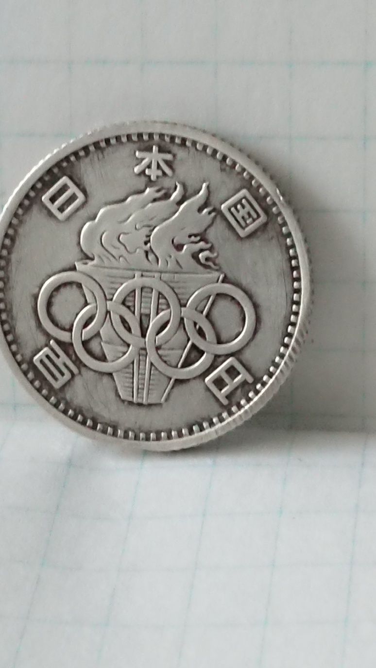 21)Монета 100 йен (Япония) Юбилейная. Серебро. Оригинал. (Олимпиада 1