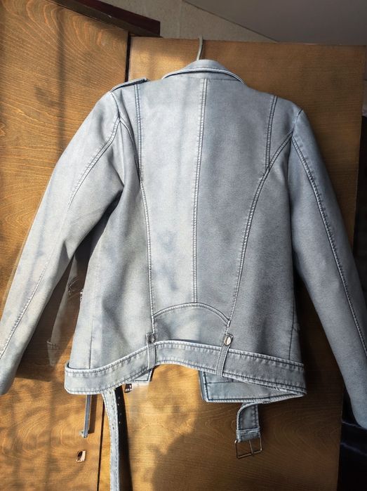 Кожана курточка .