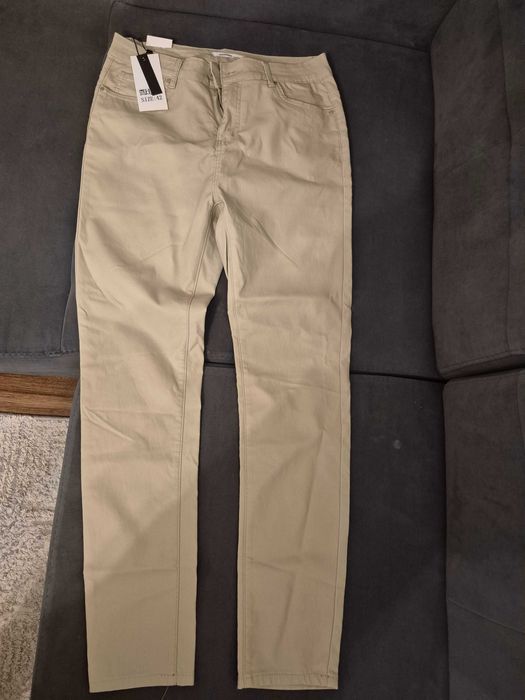 Spodnie "woskowane" nowe 42