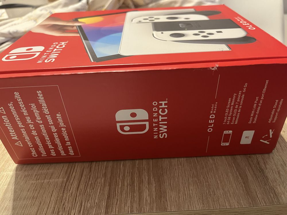Nintendo Switch OLED Branca + Mumba oficial Case
