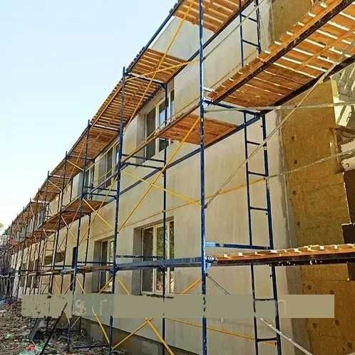 Риштування будівельне. Риштовка. ліса. Вишка тура. Строительные леса.