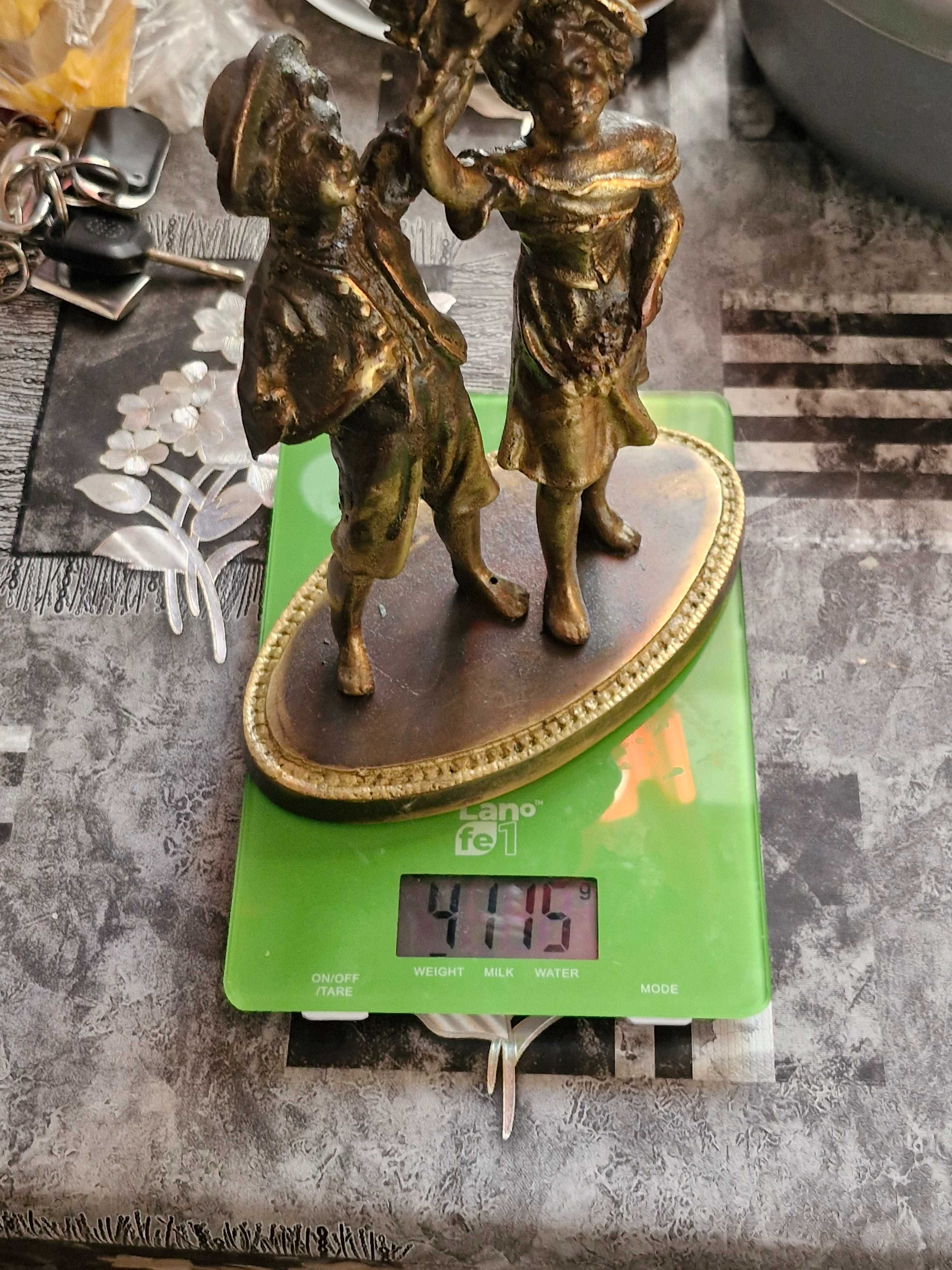 Świecznik mosiężny