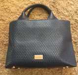 Mala azul da marca Parfois