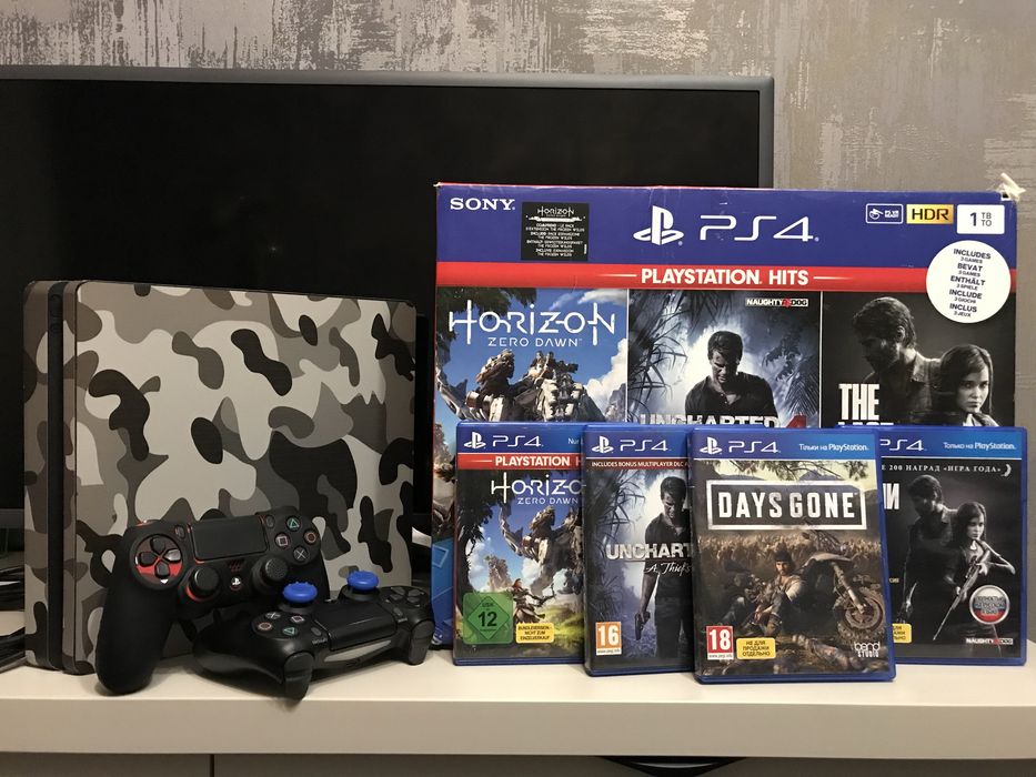 Продам PS 4 Slim 1 TB + 4 игры на дисках