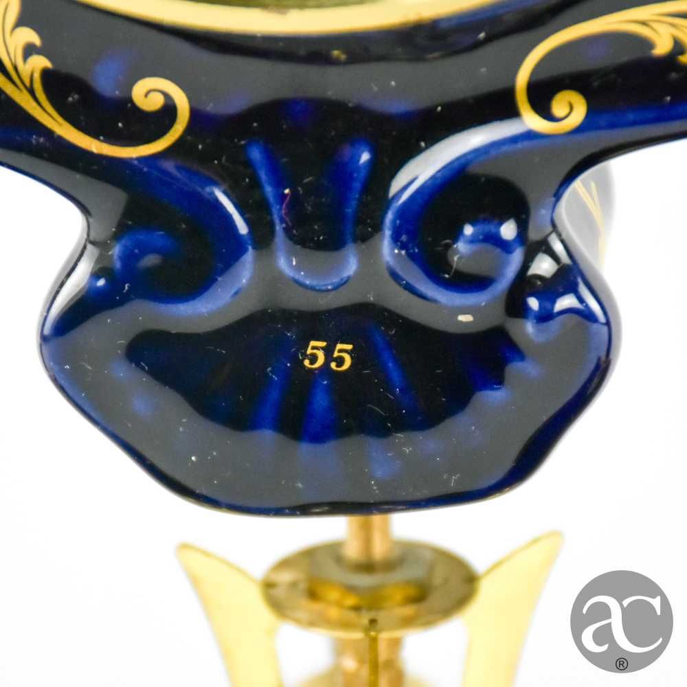 Relógio de lareira em porcelana Limoge e metal dourado