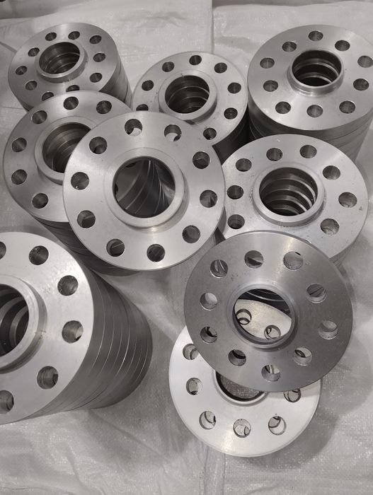 Болти колеса проставки диски центровочні кільця