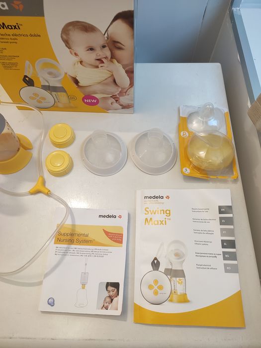 Extrator de leite elétrico duplo Medela - Como novo!