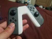 Adaptador Joy-Con Grip para o comando da Nintendo Switch