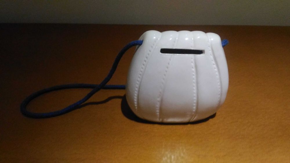 Conjunto de mealheiro e porta retratos em louça. Novo