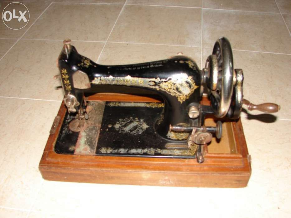 Máquina de costura antiga da Singer
