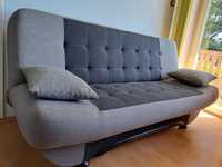Sofa rozkładana z pufami
