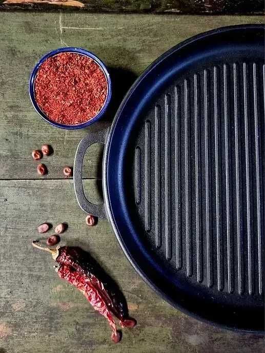 Казан чавунний узбецький об`ємом 12 л WOK із кришкою-сковородою гриль