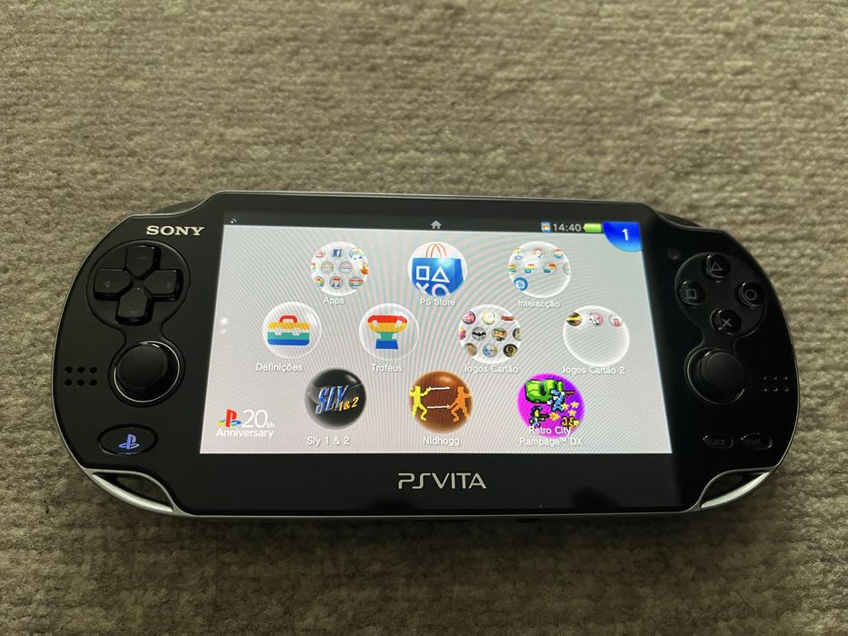 PS Vita com caixa original, 8 jogos e bolsa de transporte