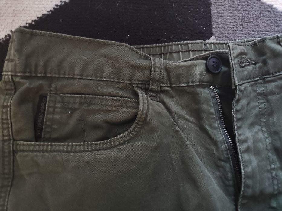 Spodnie męskie młodzieżowe zielone khaki bojówki Cropp rozmiar 34L