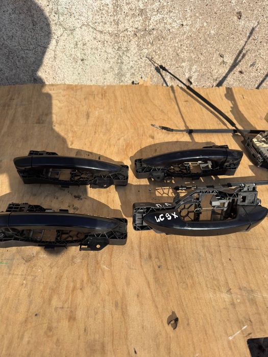 Ручки дверей замки механизмы тросики Passat B 6