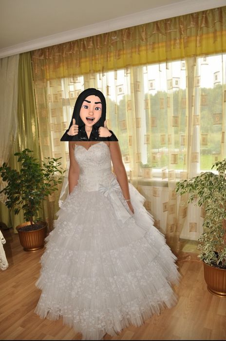 Весільна біла сукня