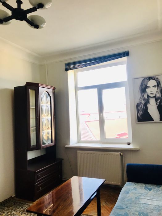 Власник. Кімната. Центр