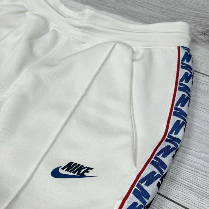 Спортивные штаны Nike Taped Pants спортивні штани найк теч фліс tech