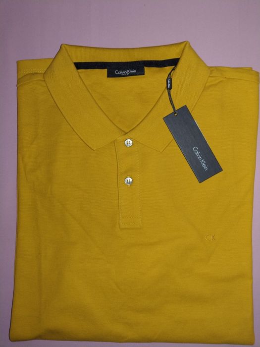 Wyprzedaż polo męskie Calvin Klein.
